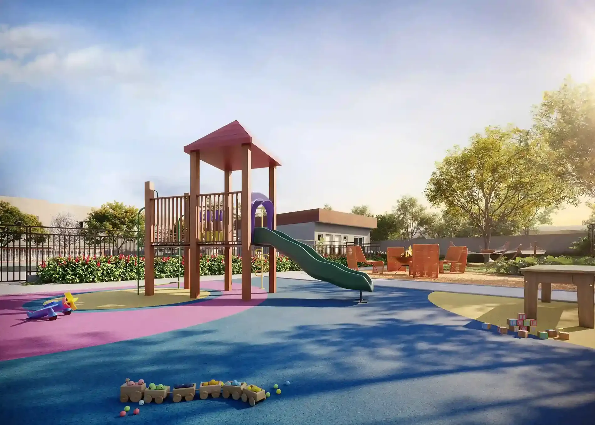 Playground com escorregador, torre de madeira e piso colorido